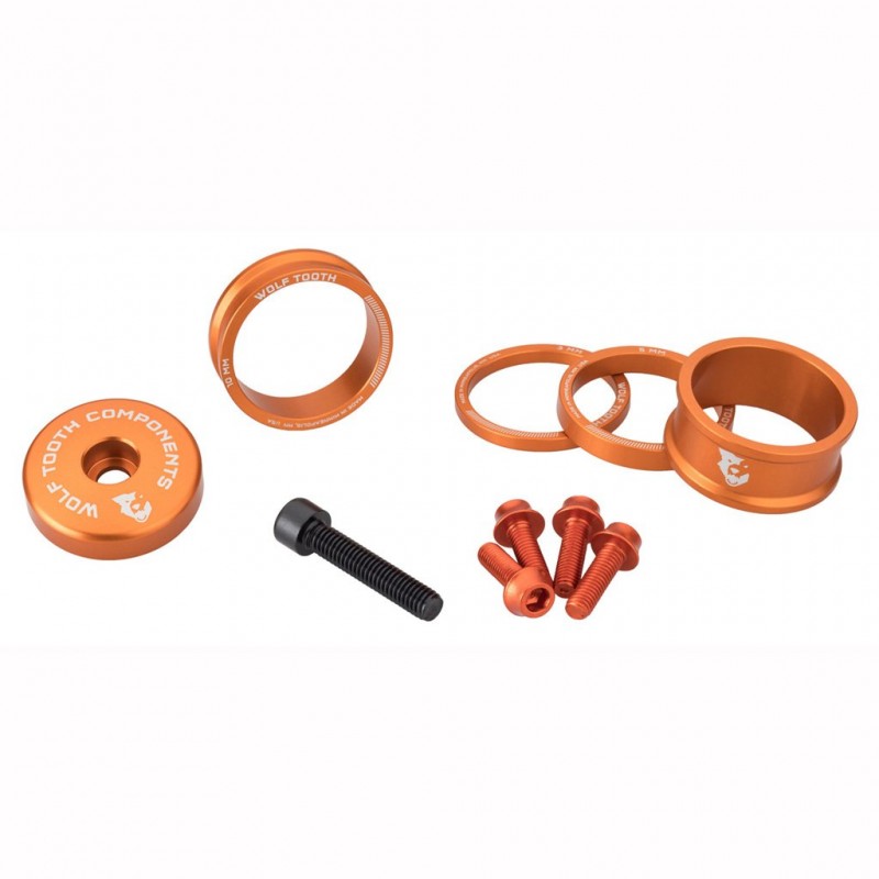 Zestaw podkładek dystansowych, osłony wspornika i śrub WOLFTOOTH BLING KIT Orange