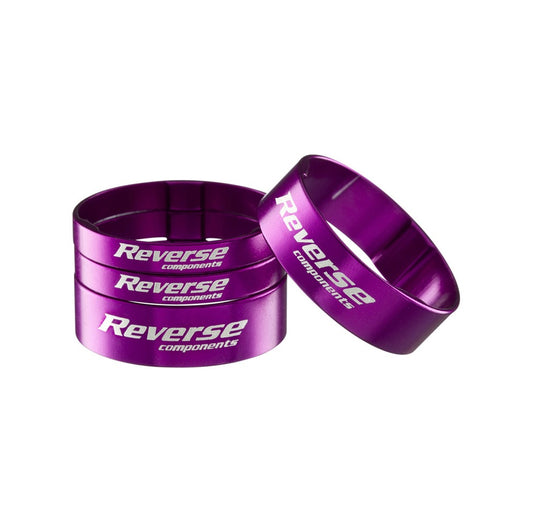 Zestaw podkładek rozdzielających układu kierowniczego REVERSE COMPONENTS z ultralekkiego aluminium 1"1/8, fioletowy
